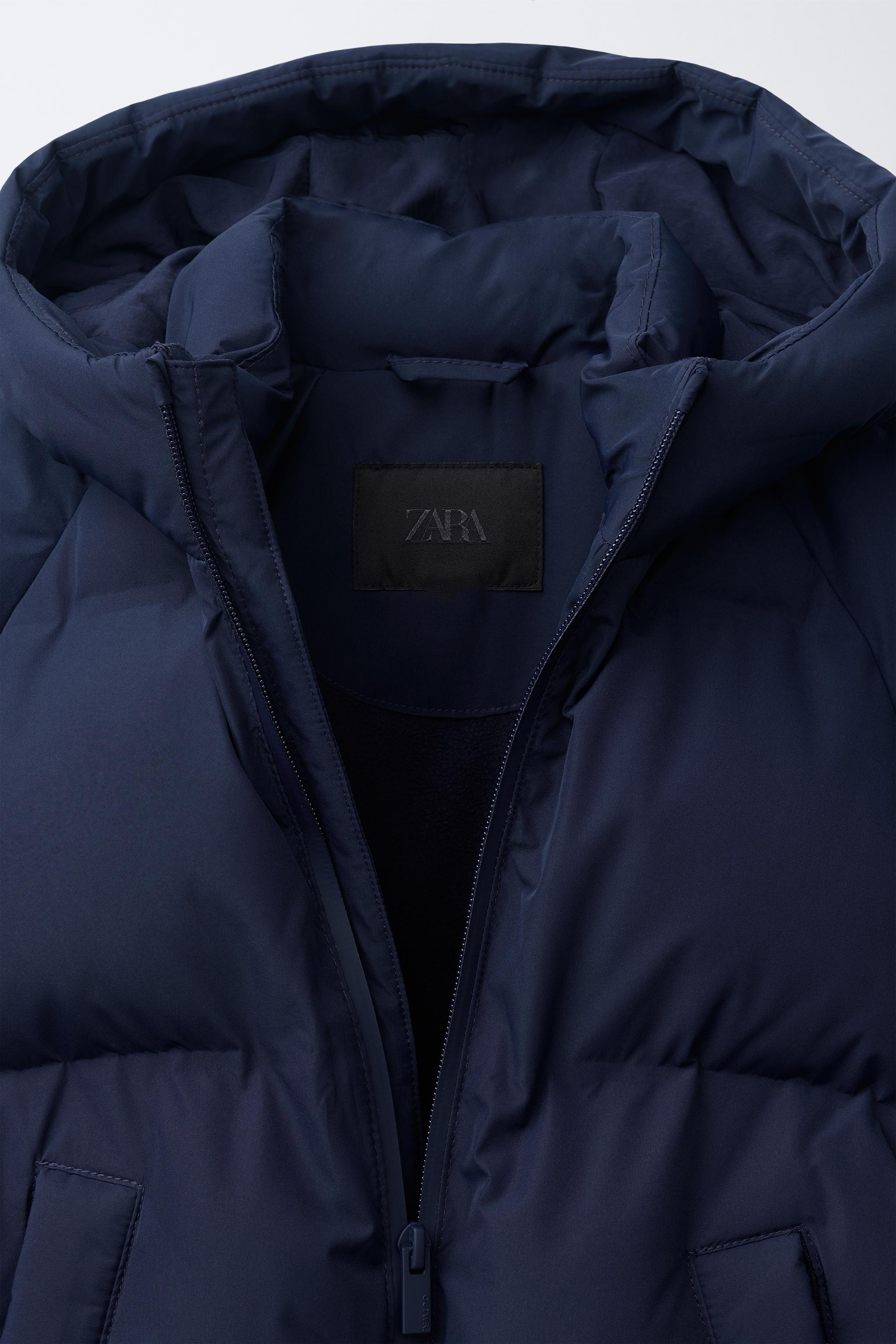 MANTEAU MATELASSÉ À CAPUCHE DÉPERLANT